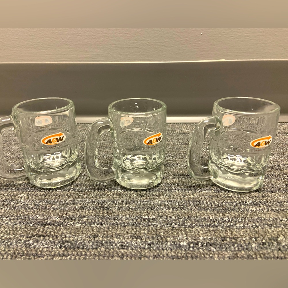 Collectable mint condition three A&W mugs 3.5 inches high 2 inch diameter.